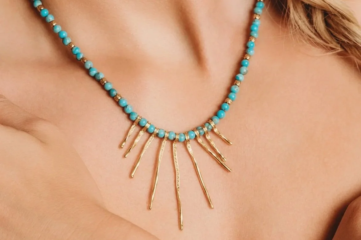 Kingman turquoise necklace with gold fringe charms