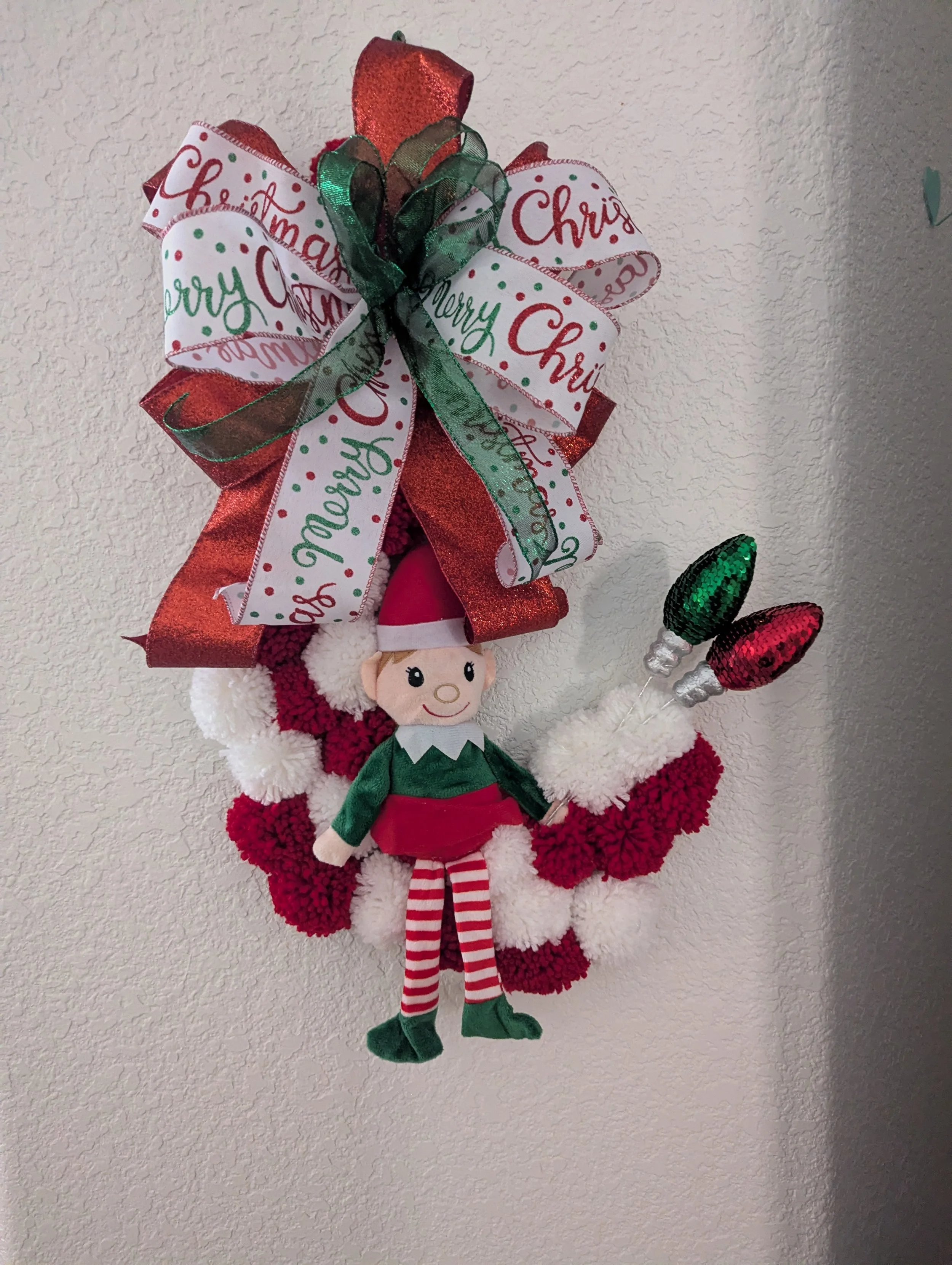 Elf Riding a Candy Cane Wreath