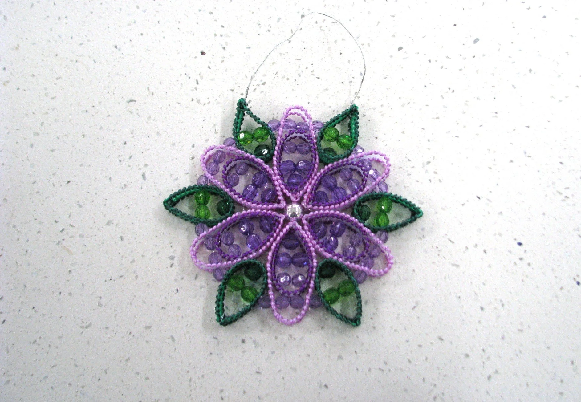 Radiant Purple Flower Suncatcher