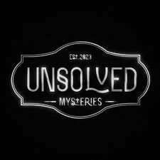 The image shows a black background with white text that reads "Est. 2823 UNSOLVED MYSTERIES" in a decorative frame.