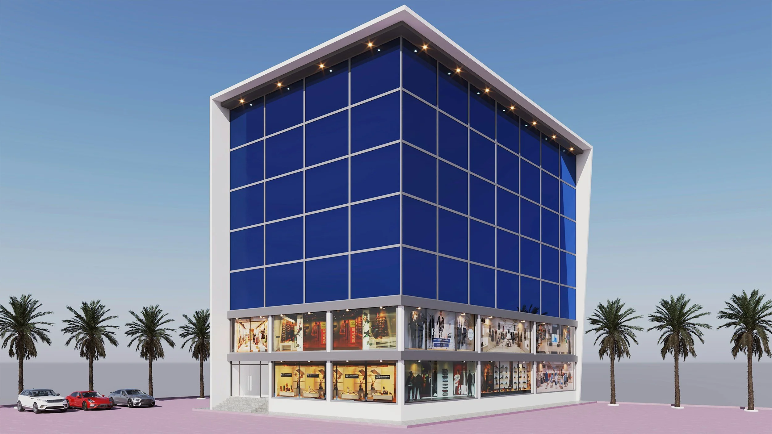 Un grand bâtiment moderne avec une façade vitrée bleue et des espaces commerciaux au rez-de-chaussée, entouré d'arbres palmiers et quelques voitures en stationnement.