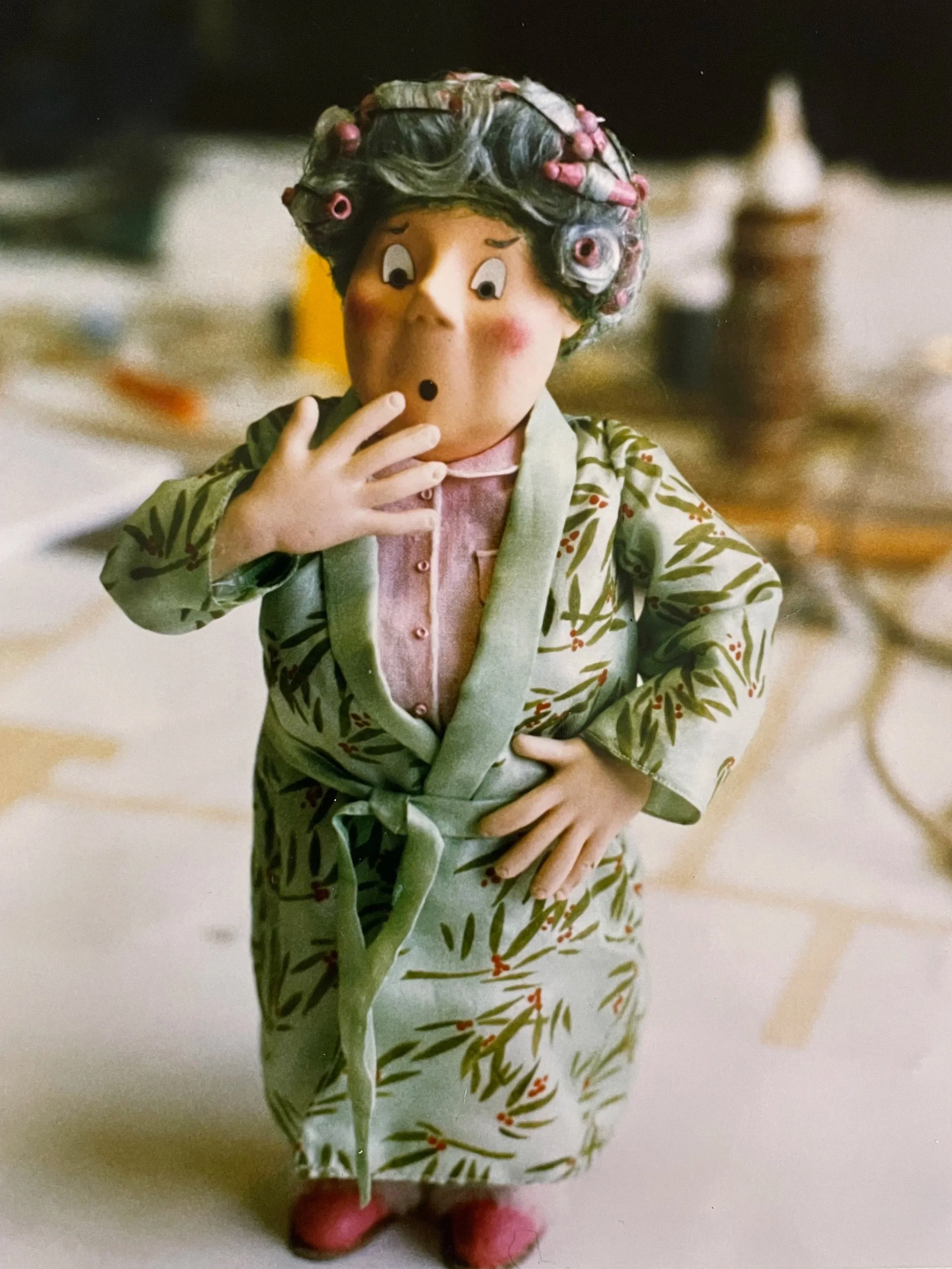 Another costume change for this character - this time her hair in rollers and a sophisticated dressing gown