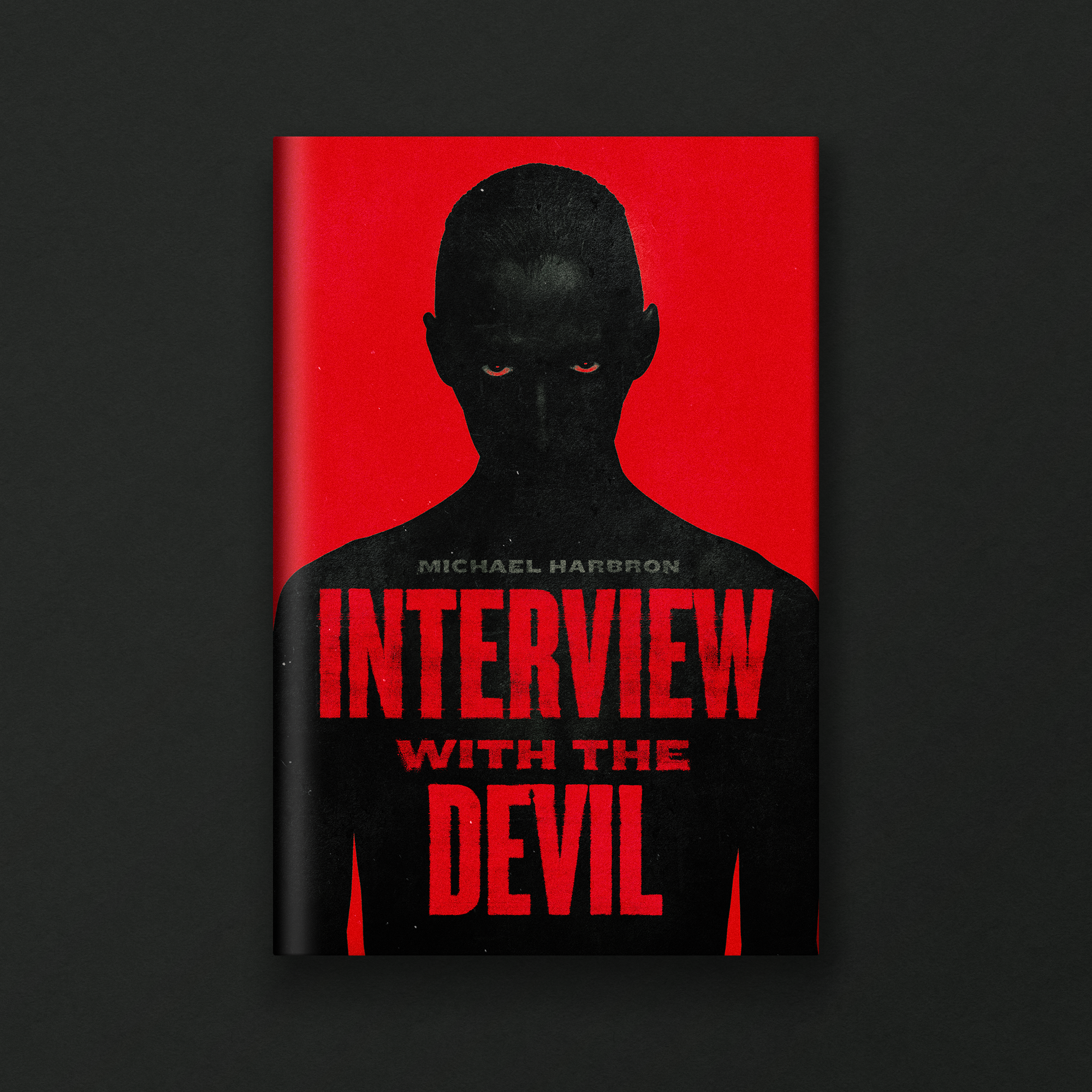 Book cover featuring a silhouette of a person's head with a red background. The title reads 'INTERVIEW WITH THE DEVIL' and the author's name is MICHAEL HARBORN.