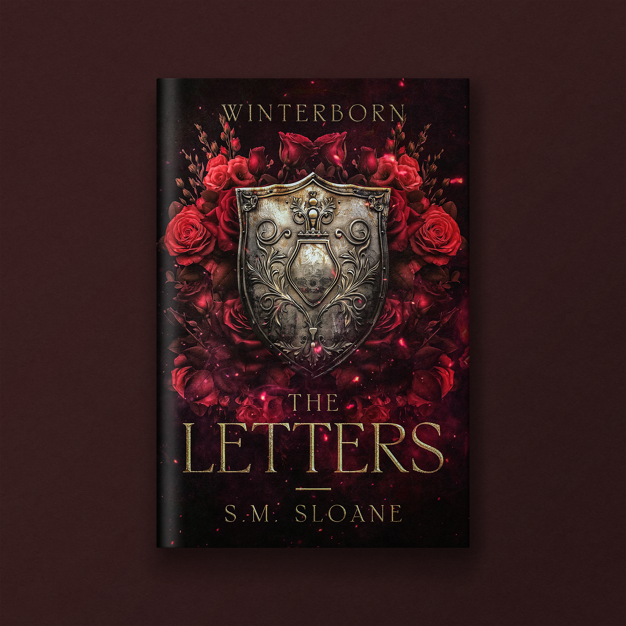 Cover of the book titled 'Winterborne' by S.M. Sloane, featuring a shield emblem surrounded by red roses and dark background