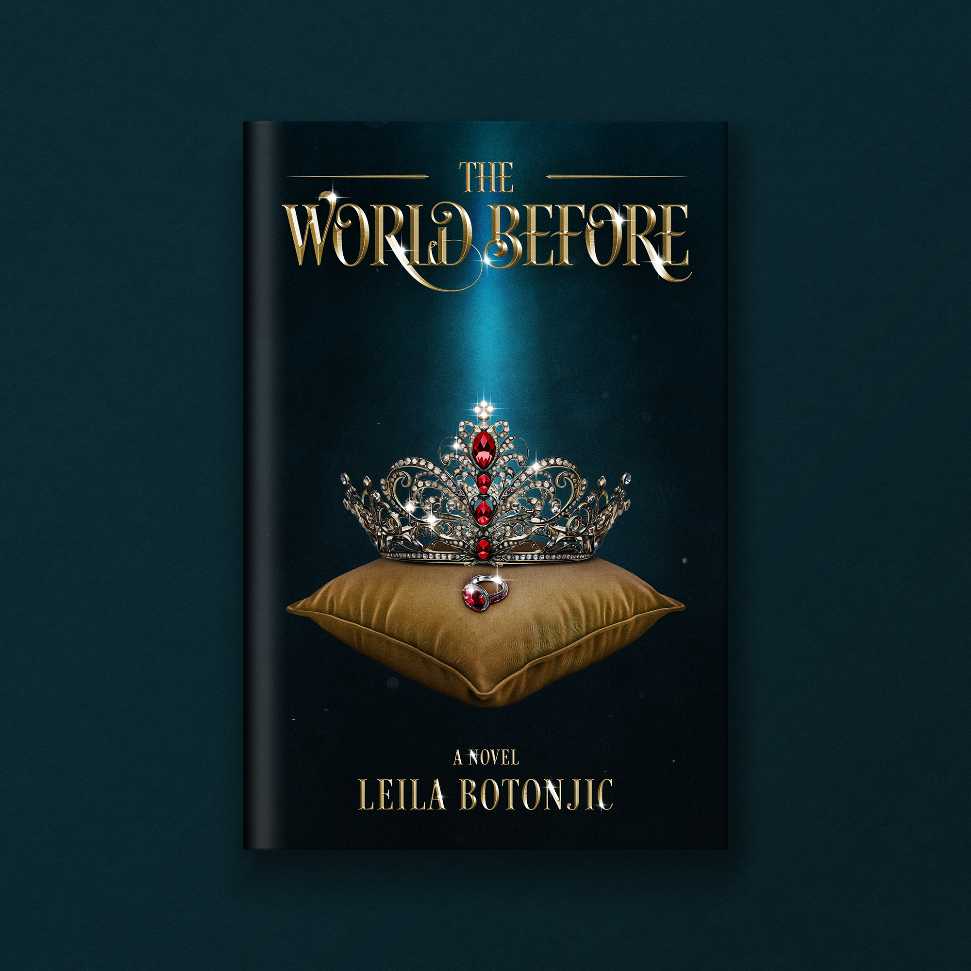 Cover of a book titled "The World Before" by Leila Botonjic. The cover features a diamond tiara with red and clear gemstones, resting on a brown pillow, on a dark background.