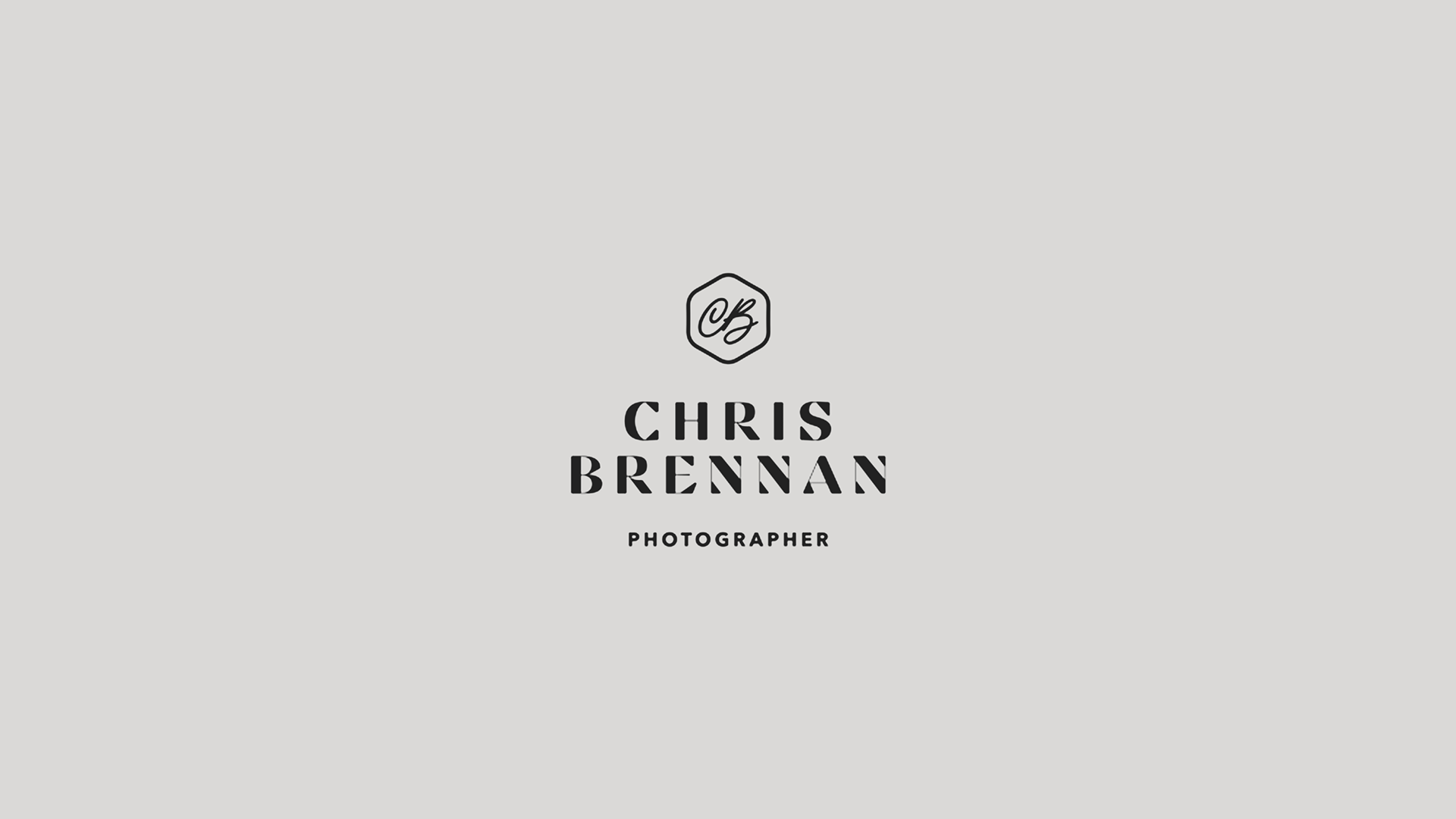 Business card for photographer Chris Brennan with a light gray background, black text, and a hexagonal logo containing initials CB.