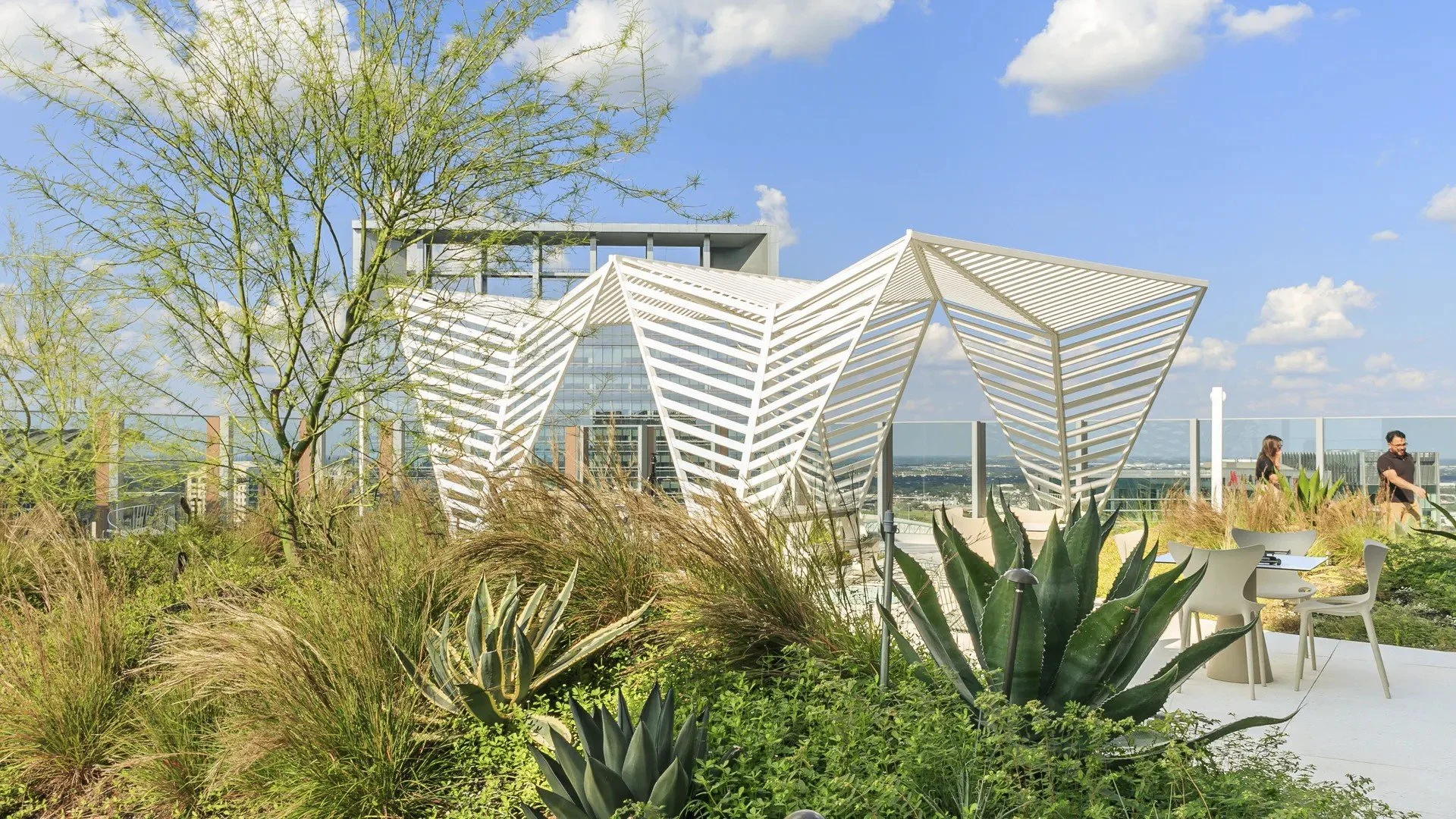 Planted terrace and sculptural shade structure at Norton Rose Fulbright Tower. Photograph: Maribel Amador.