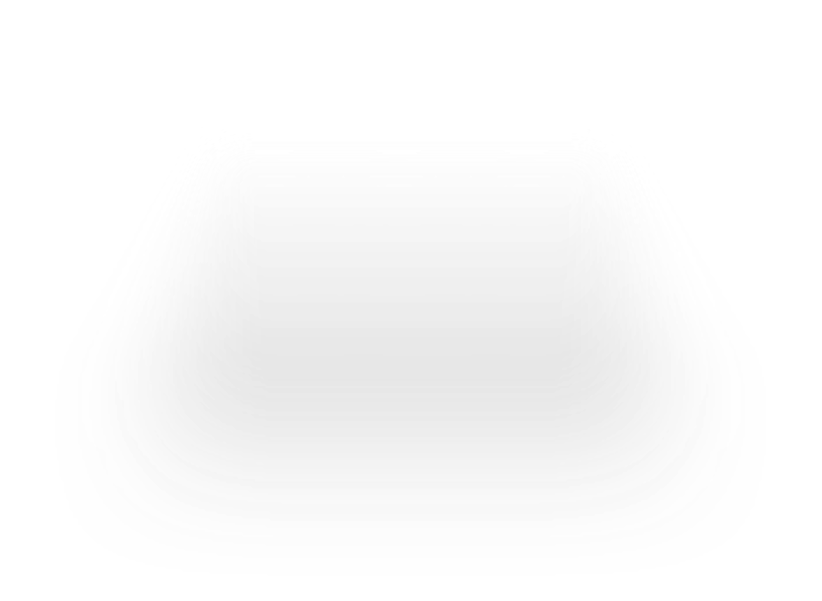 Close-up of a computer chip with a metallic surface and small circular components, placed on a yellow circuit board.