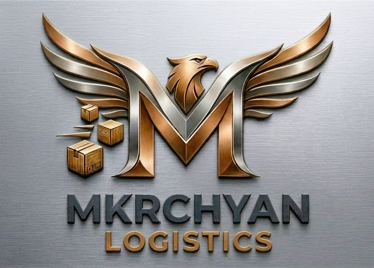 A logo for MKRCHYAN Logistics featuring a stylized letter M with an eagle head at the center, metallic wings extending outward, and three wooden crates to the left.