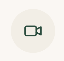 Video camera icon on a plain background