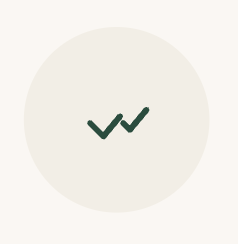 Green checkmark icon in the center of a light beige circle on a white background.