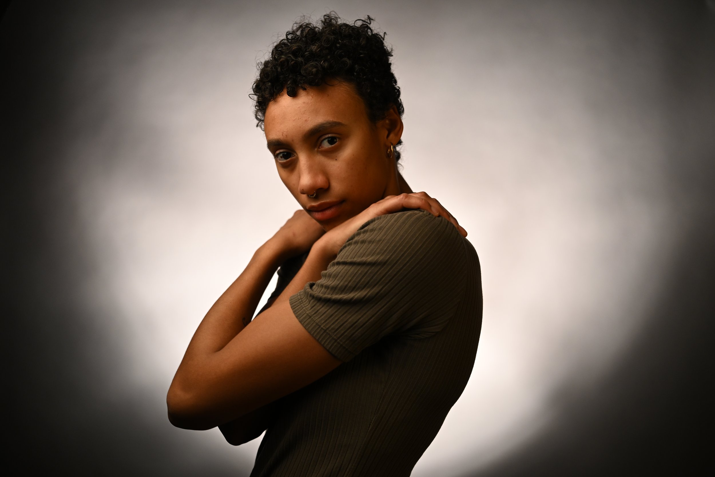Isabella Sokolova, 23, ponders her future behind the camera on March 31 at Lee Hills Hall photo studio in Columbia, Mo. Sokolova left a track and field career behind and is now racing towards a different finish line. "Right now, I'm most looking forw