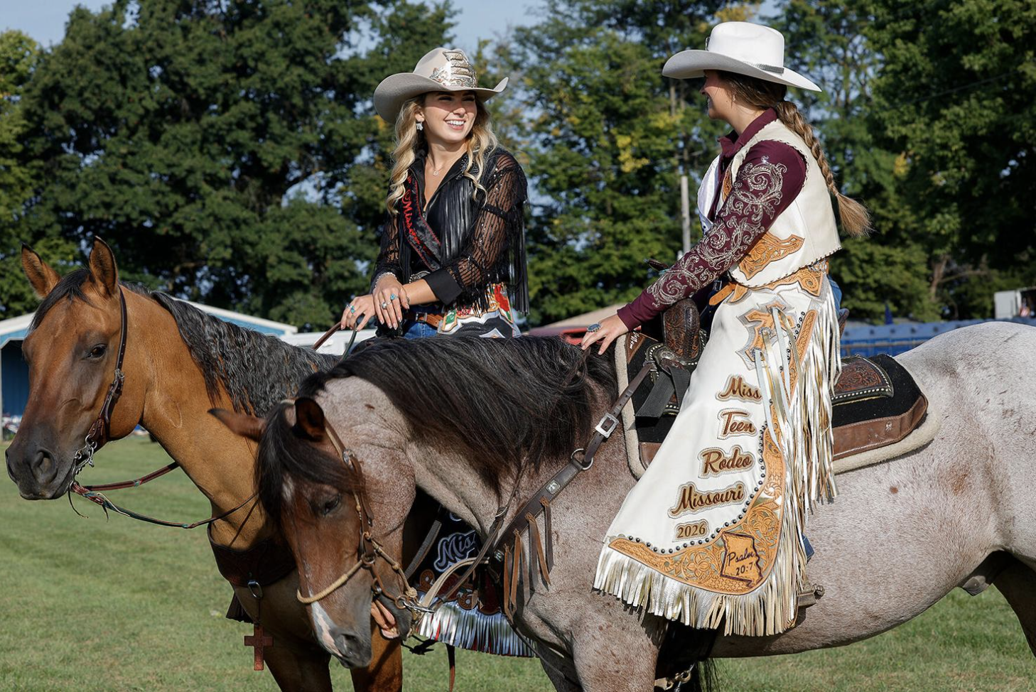 Miss Rodeo Missouri Madison Goetz, left, prepares to lead the Cattlemen Days Parade with Miss Teen Rodeo Missouri Miley Mae Phillips on Aug. 29 at the Ashland Optimist Club. “It’s really important to get young kids involved in rodeo. That’s just a bi