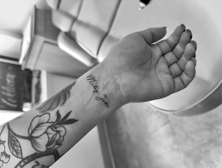 Fine Line Tattoo - script wrist tattoo