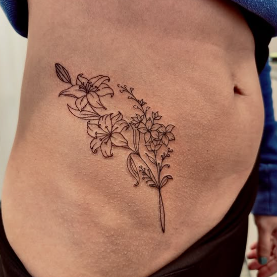 Fine Line Tattoo - floral hip ribs tattoo