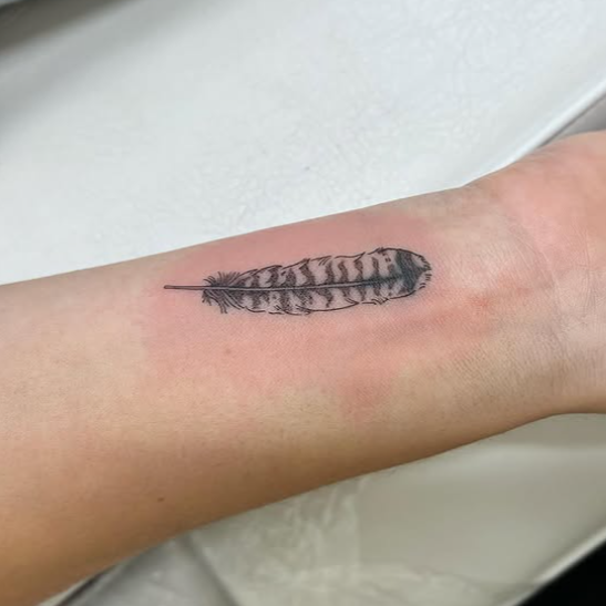 Fine Line Tattoo - cover up feather tattoo