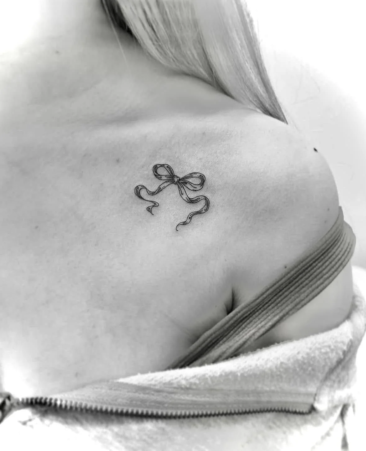 Fine Line Tattoo - delicate bow tattoo