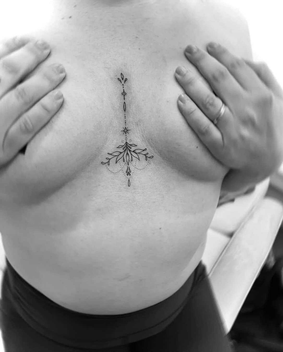 Fine Line Tattoo - ornamental sternum tattoo