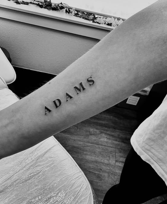 Fine Line Tattoo - text forearm tattoo