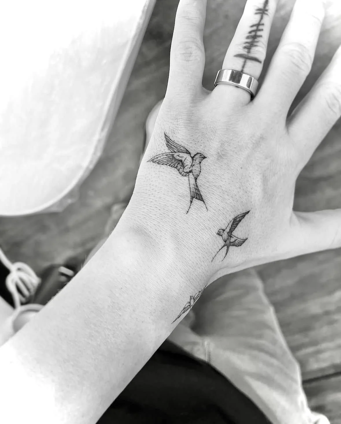 Fine Line Tattoo - birds hand tattoo