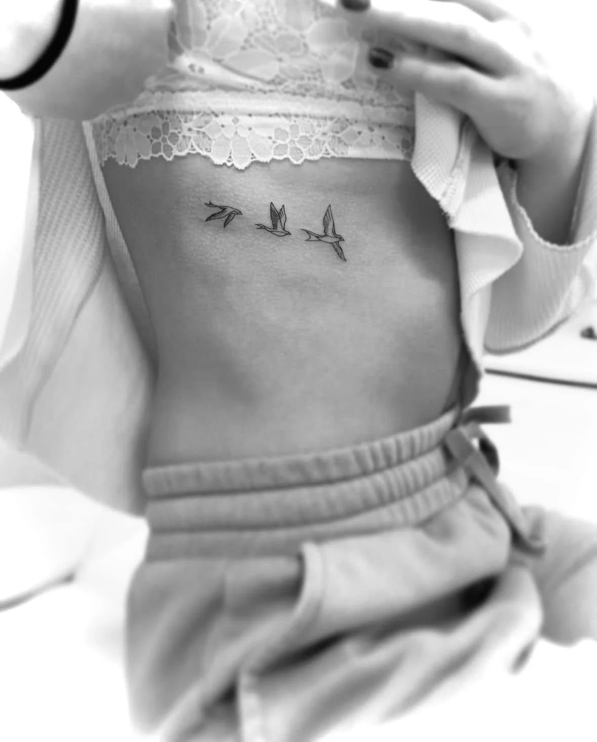 Fine Line Tattoo - birds rib tattoo