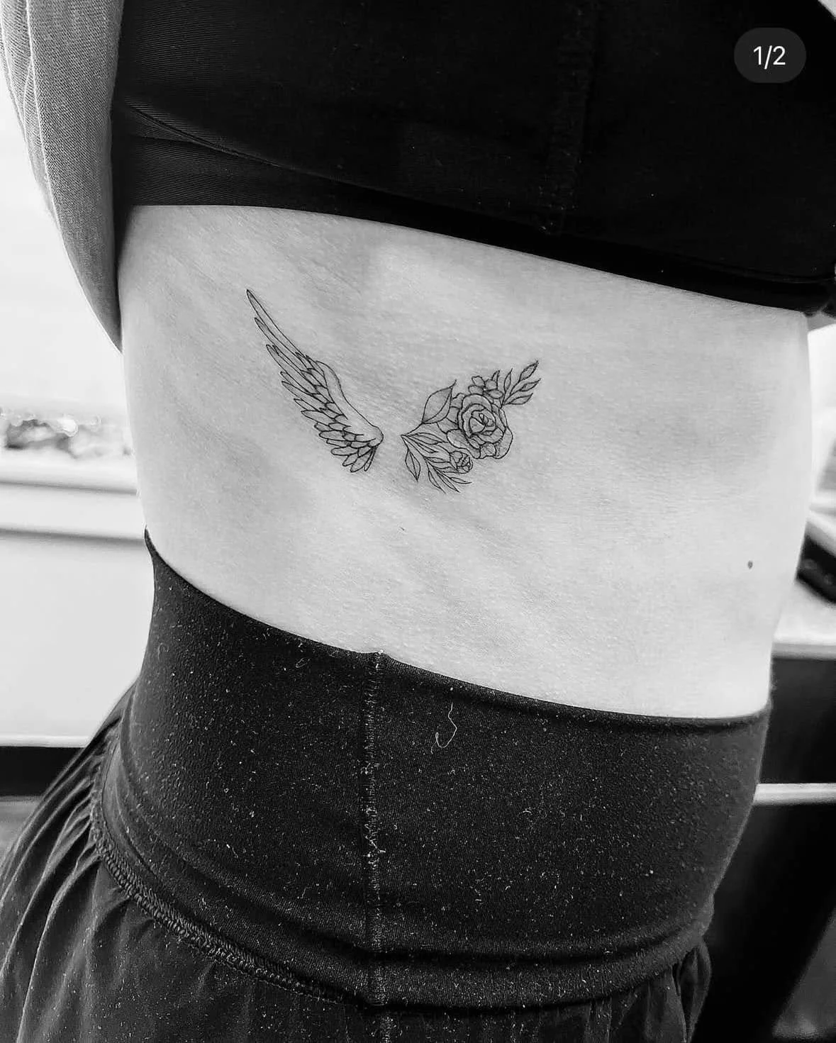 Fine Line Tattoo - wings and flowers tattoo