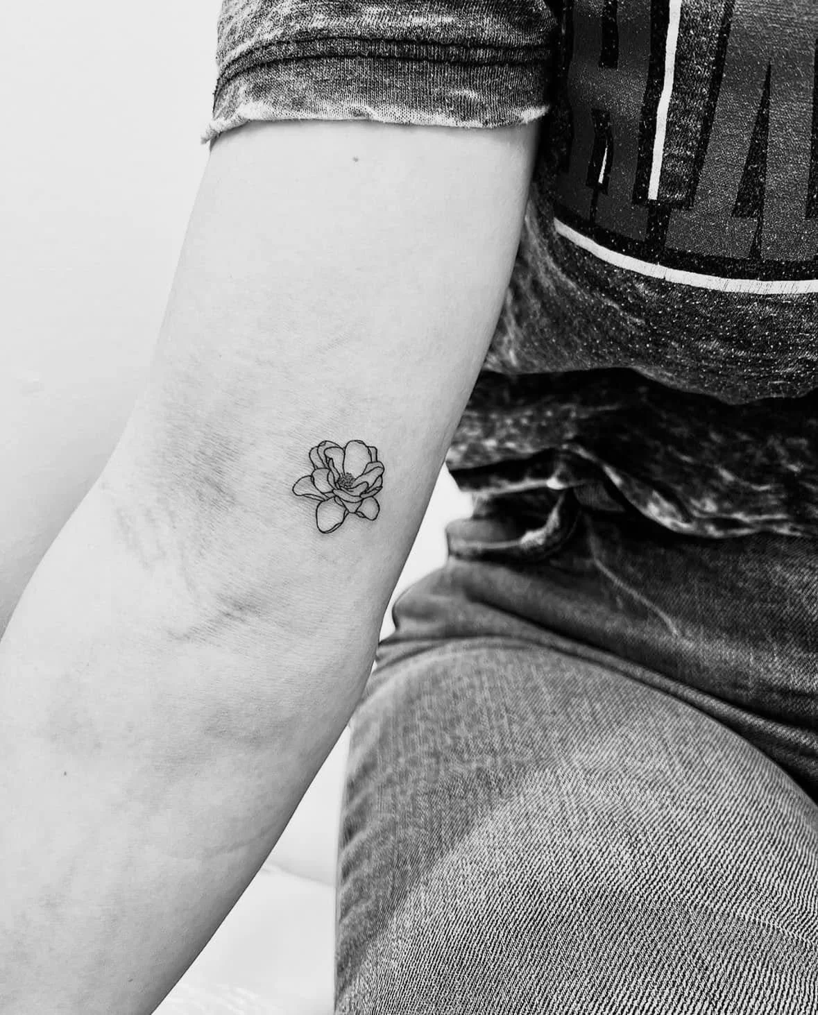 Fine Line Tattoo - tiny flower tattoo