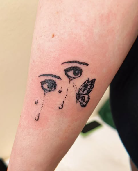 Fine Line Tattoo - eyes butterfly silhouette tattoo