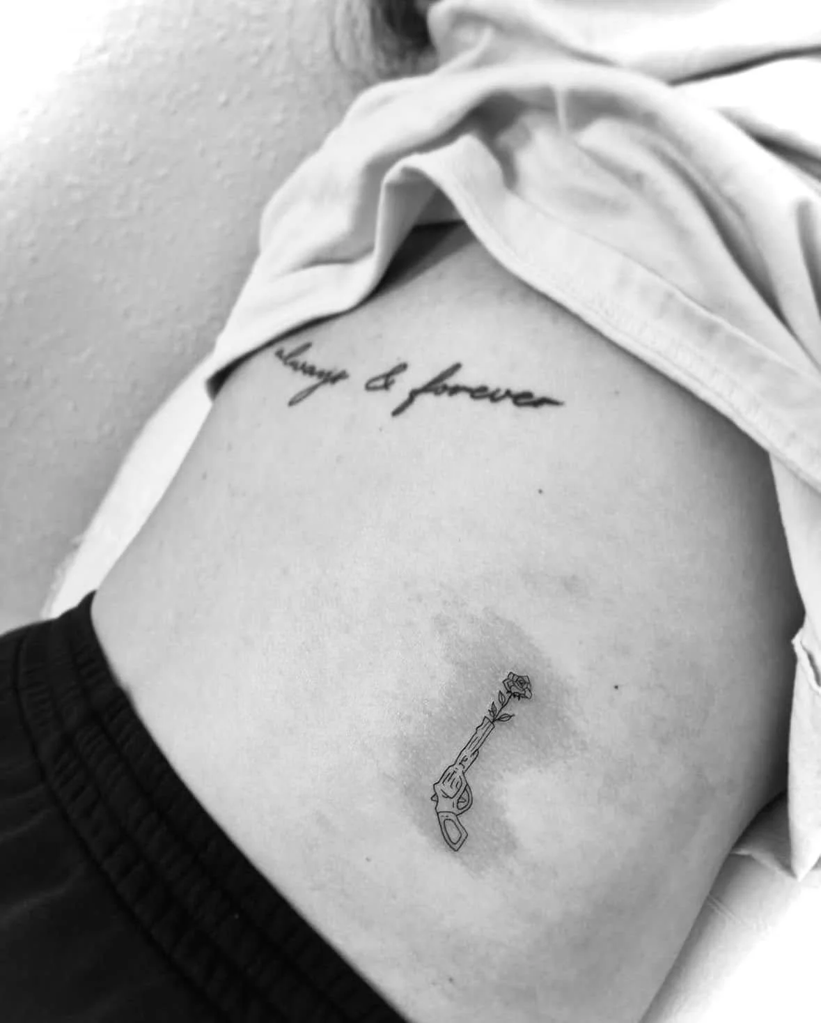 Fine Line Tattoo - gun and rose tattoo