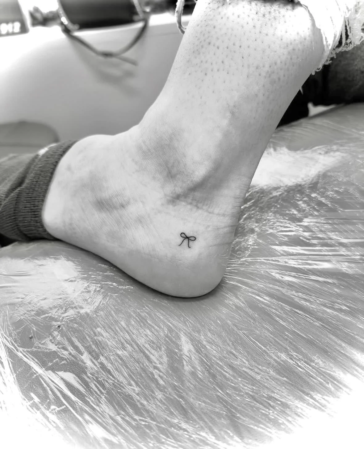 Fine Line Tattoo - tiny bow tattoo