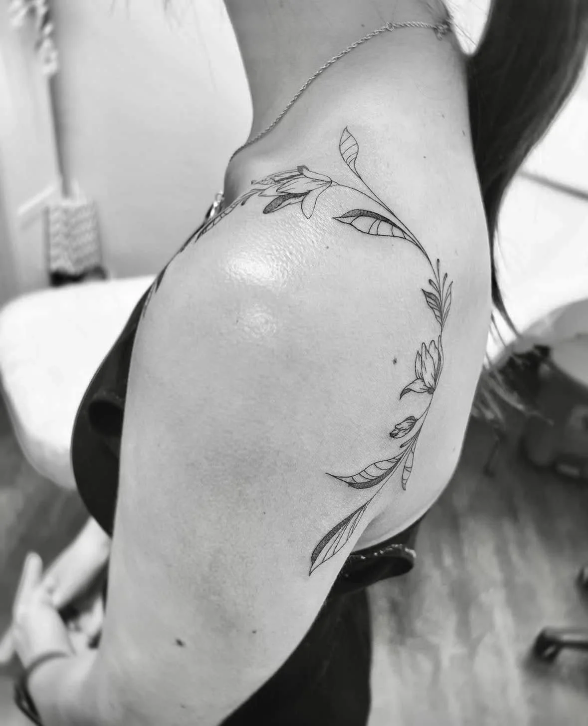 Fine Line Tattoo - floral strap tattoo