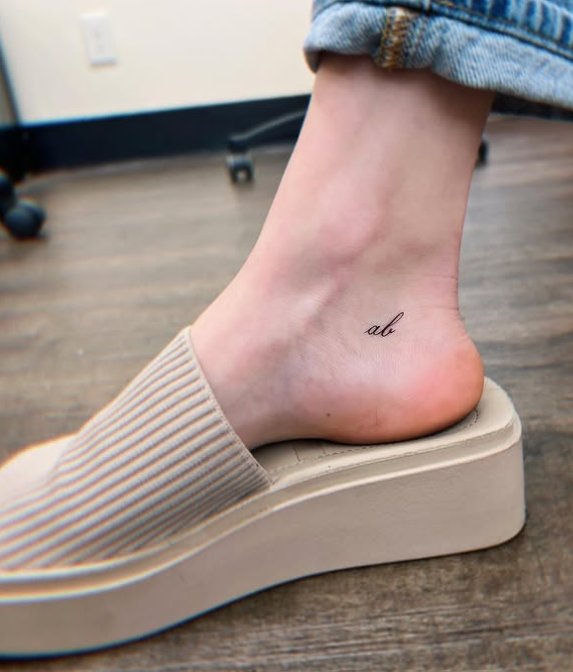 Fine Line Tattoo - tiny calligraphy ankle tattoo