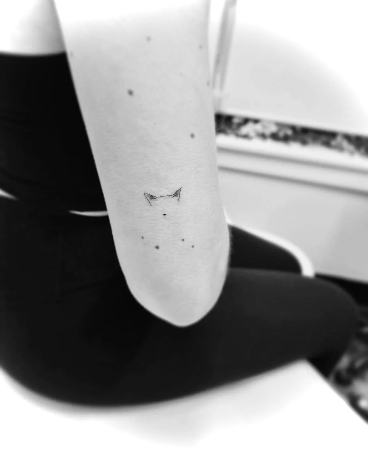 Fine Line Tattoo - tiny cat tattoo