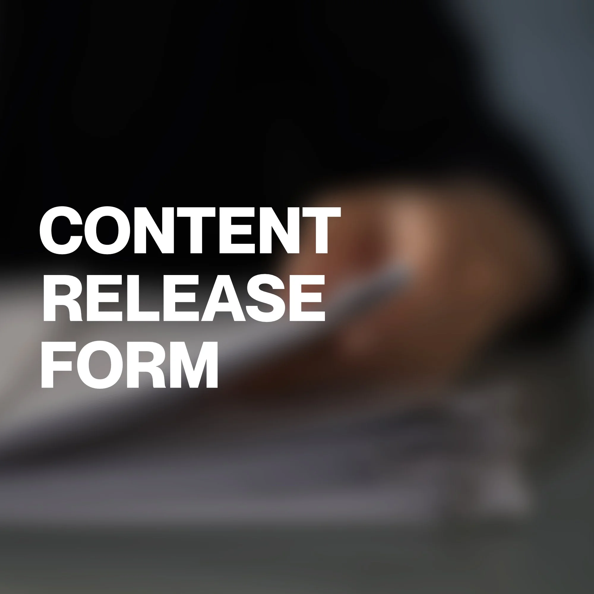 Partial view of a blurred black and gray background with white text saying 'CONTENT RELEASE FORM'.