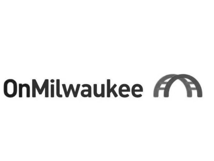 Logo of OnMilwaukee with stylized bridge icon in black and gray.