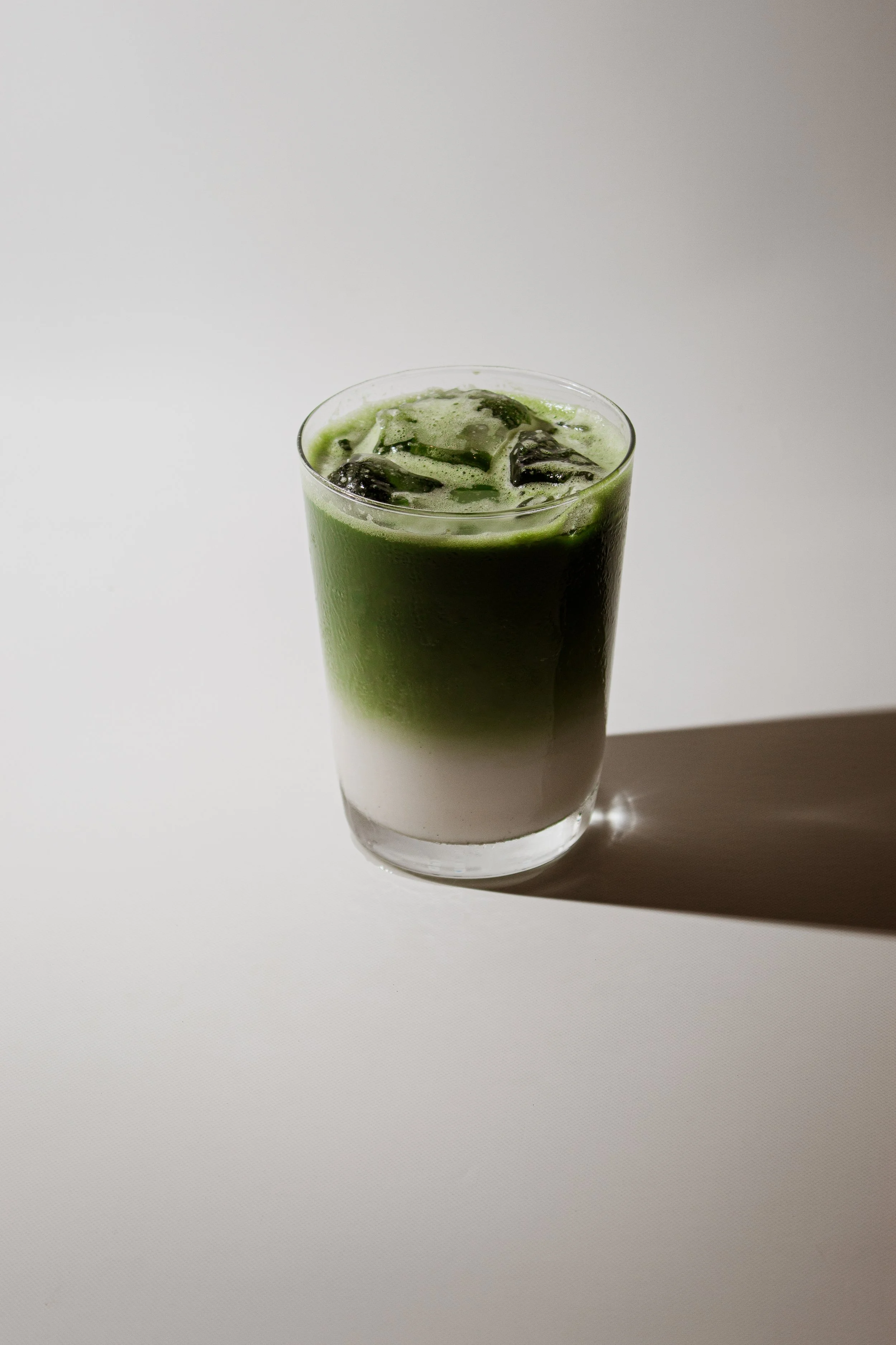 Ceremonial matcha with coconut cream, a signature offering at REMU Tulum.