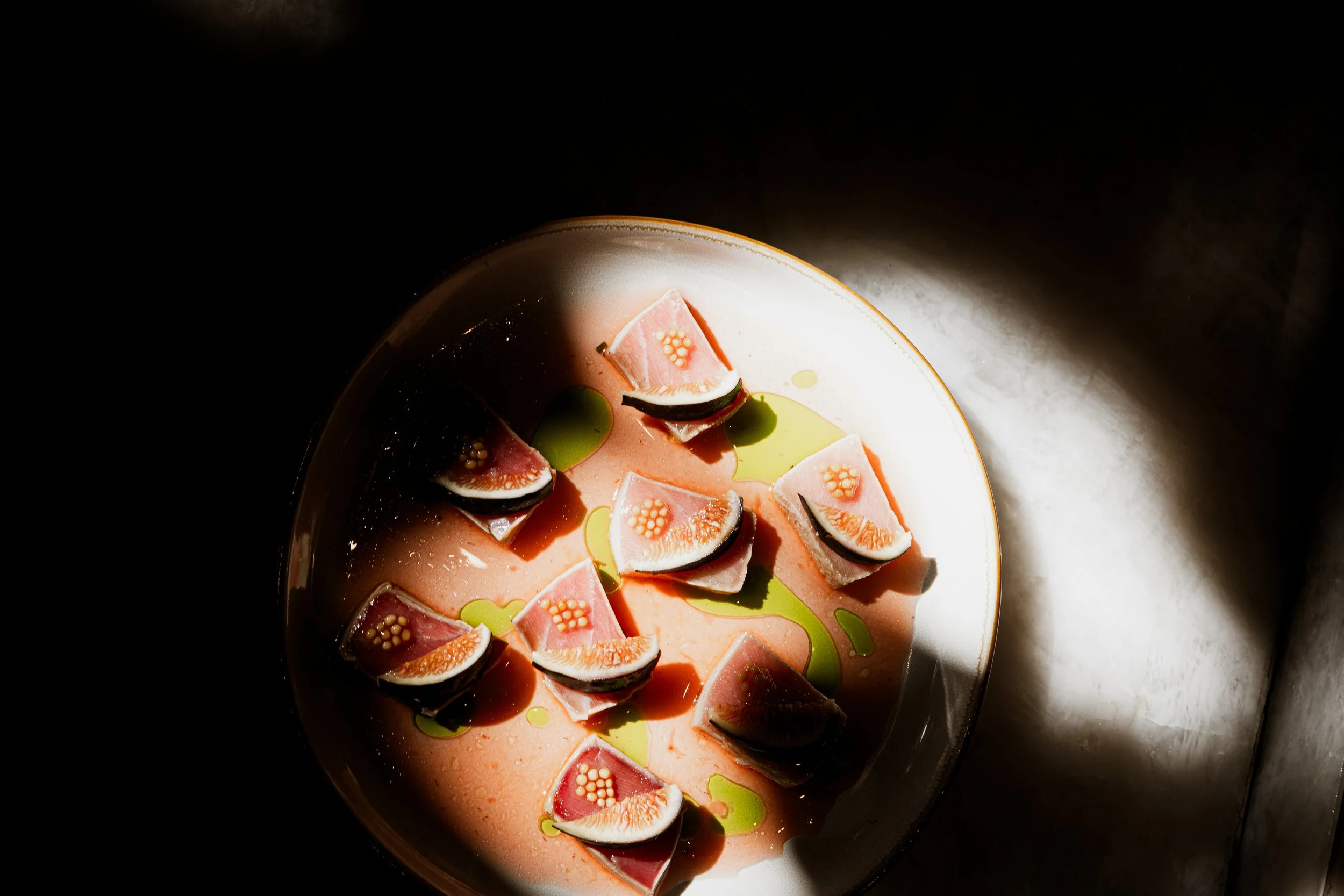 Lightly torched bluefin chutoro with fresh fig and fermented mustard at REMU sushi and matcha bar in Tulum.