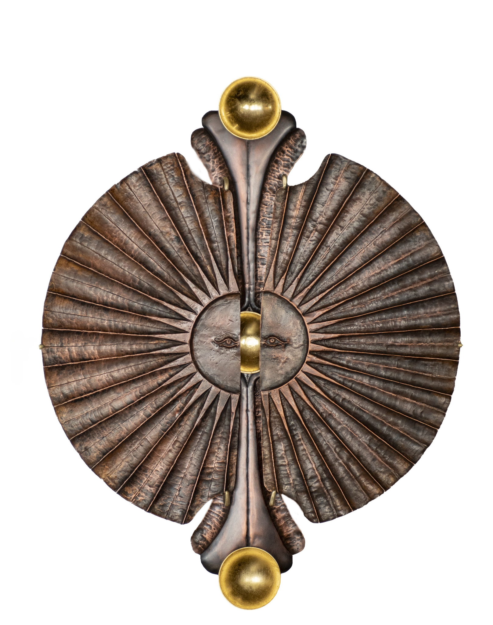 Decorative metallic wall art resembling an abstract face with fan-shaped, textured brown and silver elements, accented with gold circular details at the top and bottom.