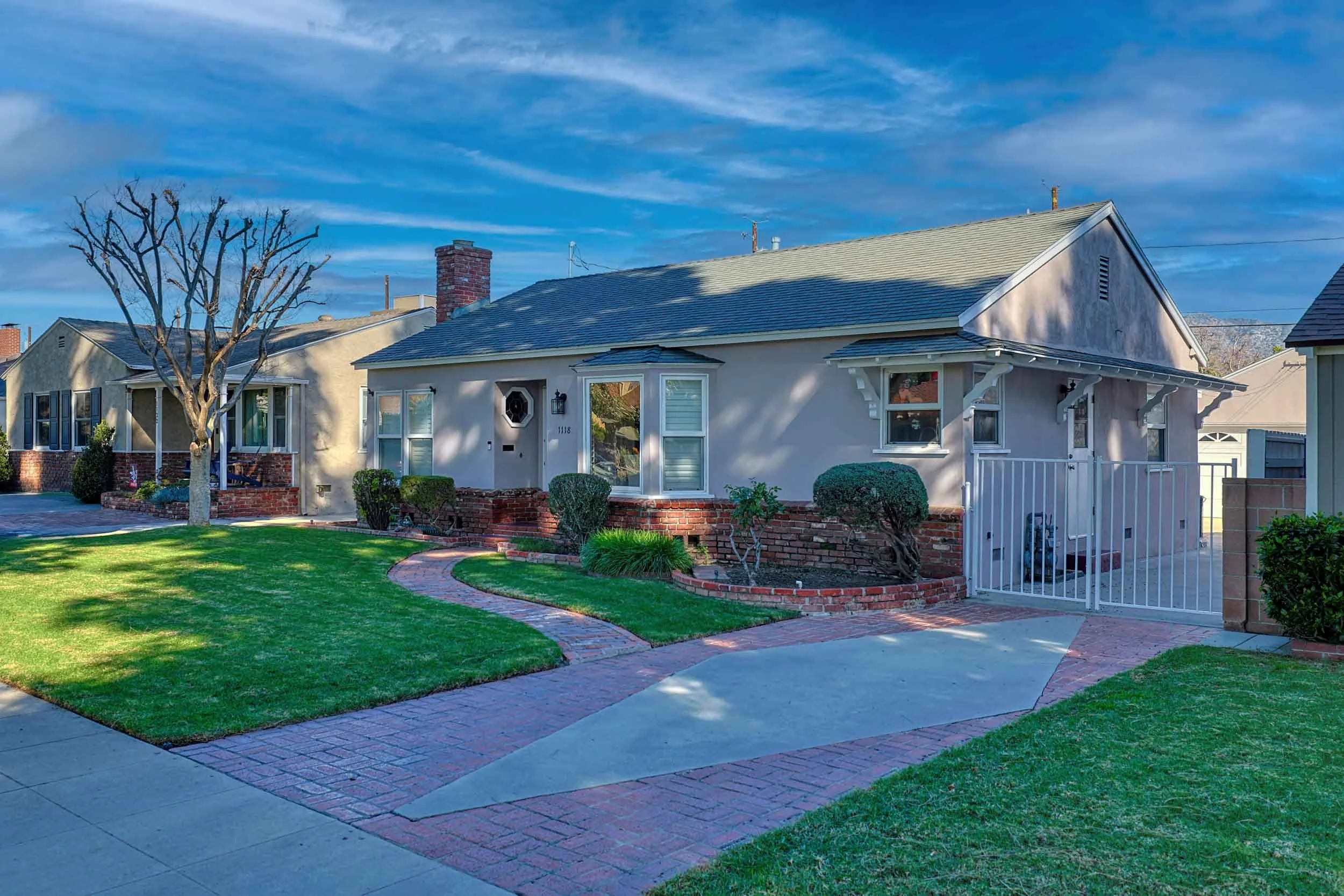 Professional real estate photo of single-family home at 1118 N Niagara Street, Burbank, CA 91505 — upgraded kitchen with Caesarstone countertops and custom cabinetry.