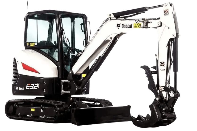 A Bobcat E32 mini excavator with a white and black cab, tracked undercarriage, and a hydraulic arm with a bucket attachment.