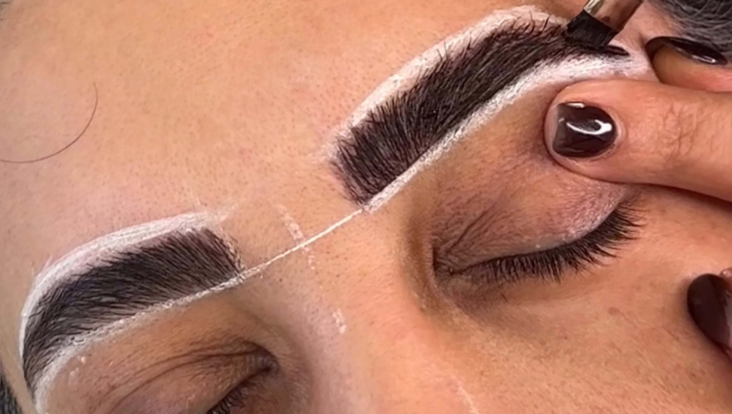 Brow sculpt and tint shaping in progress at La Signora, Mount Martha
