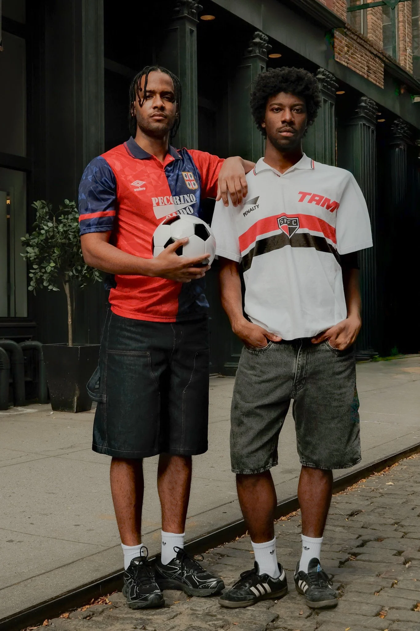 two-men-soccer-jerseys-cobblestone-full-body-2.jpg