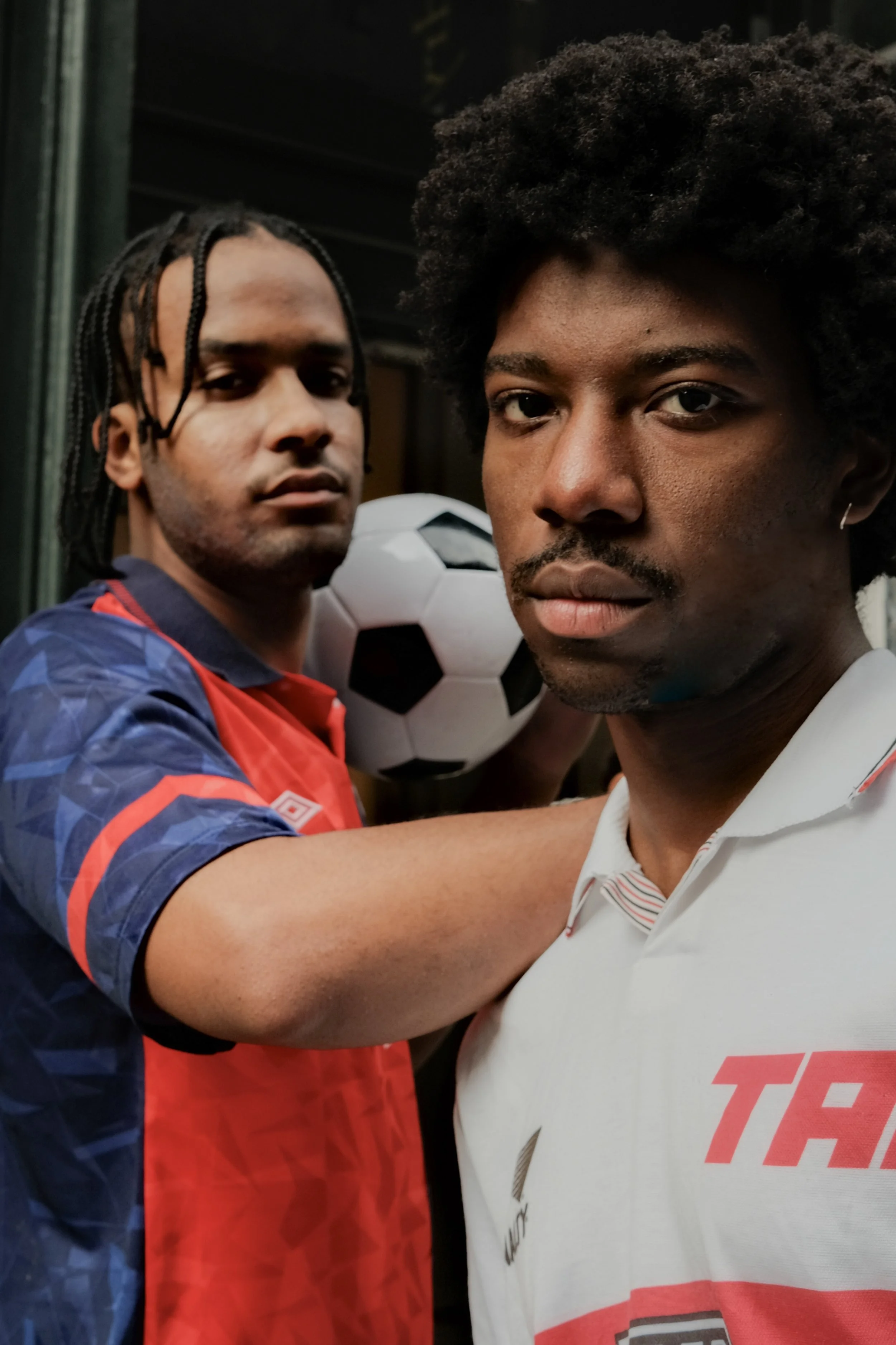 two-men-soccer-jerseys-close-up.jpg