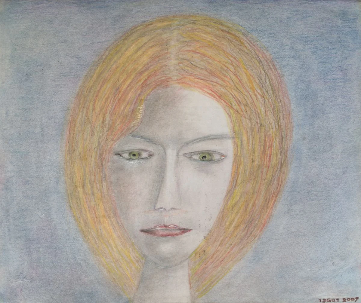 A colored pencil drawing of a woman's face with green eyes, red lips, and orange hair against a blue background.