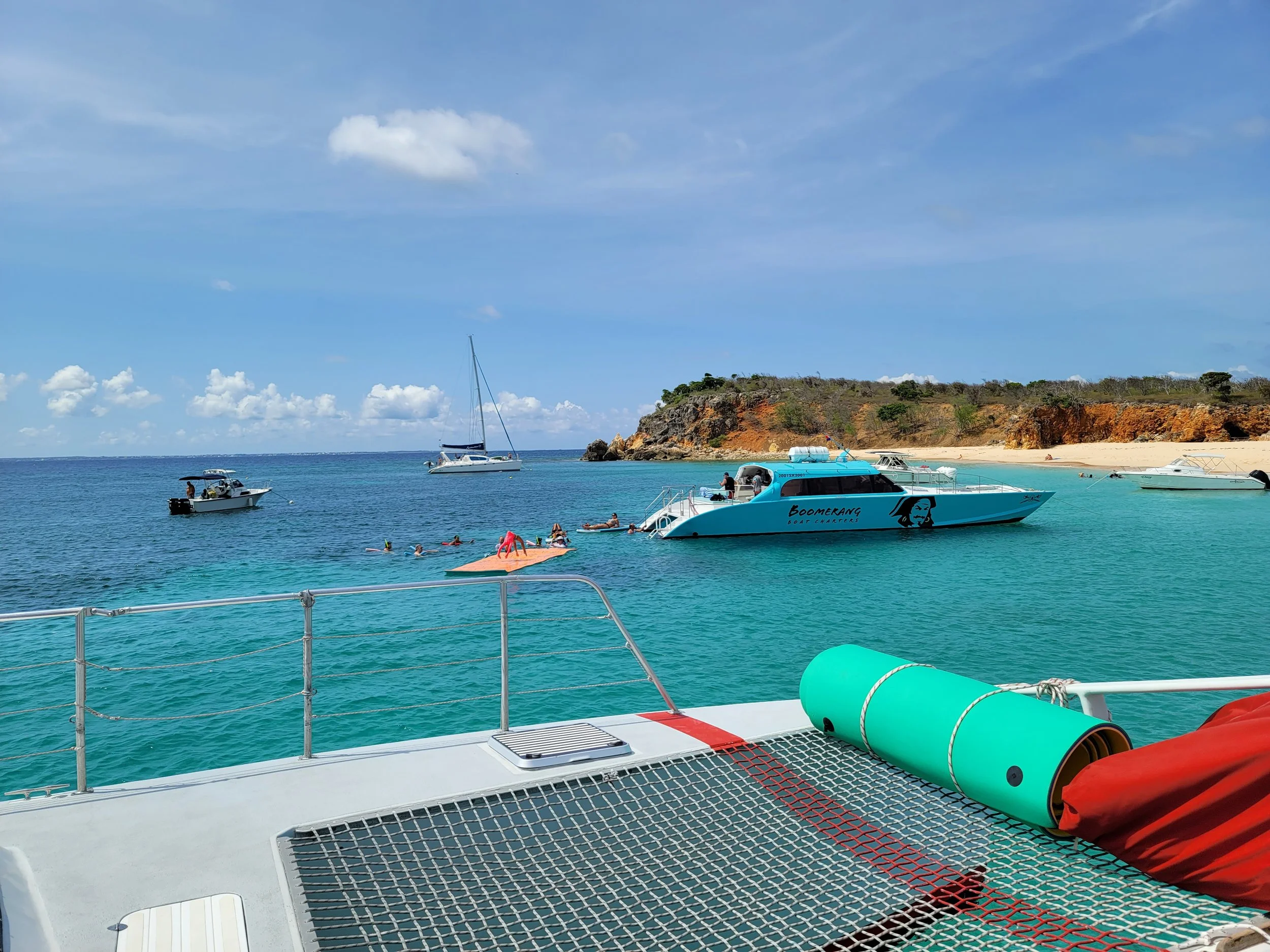 Crystal clear waters of Tintamarre island from a catamaran cruise departing St. Martin — Tidal & Rare luxury Caribbean travel
