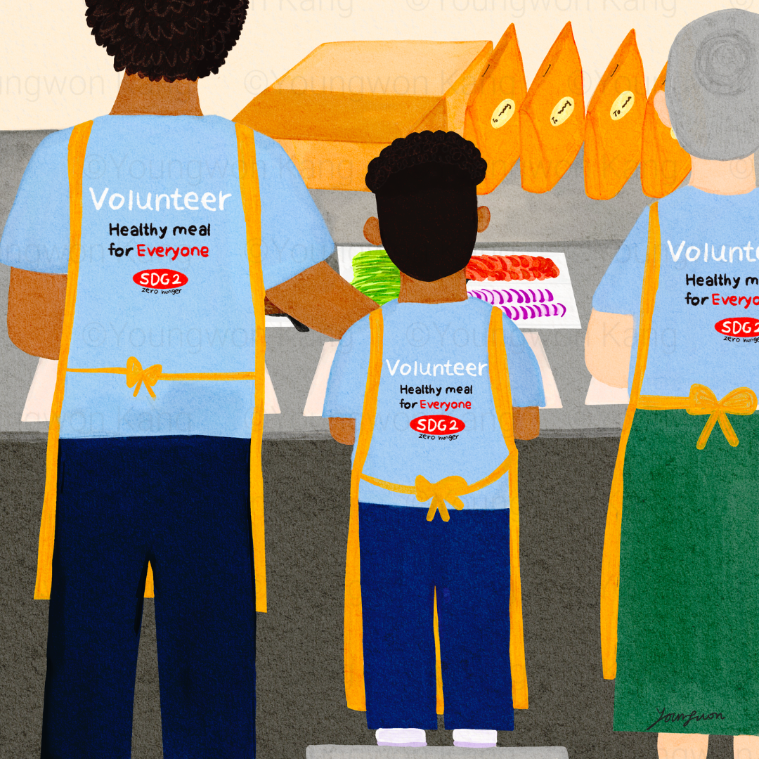 Three volunteers standing behind a table preparing food for a community service event. They are wearing light blue shirts with yellow aprons. There are slices of vegetables on the table.