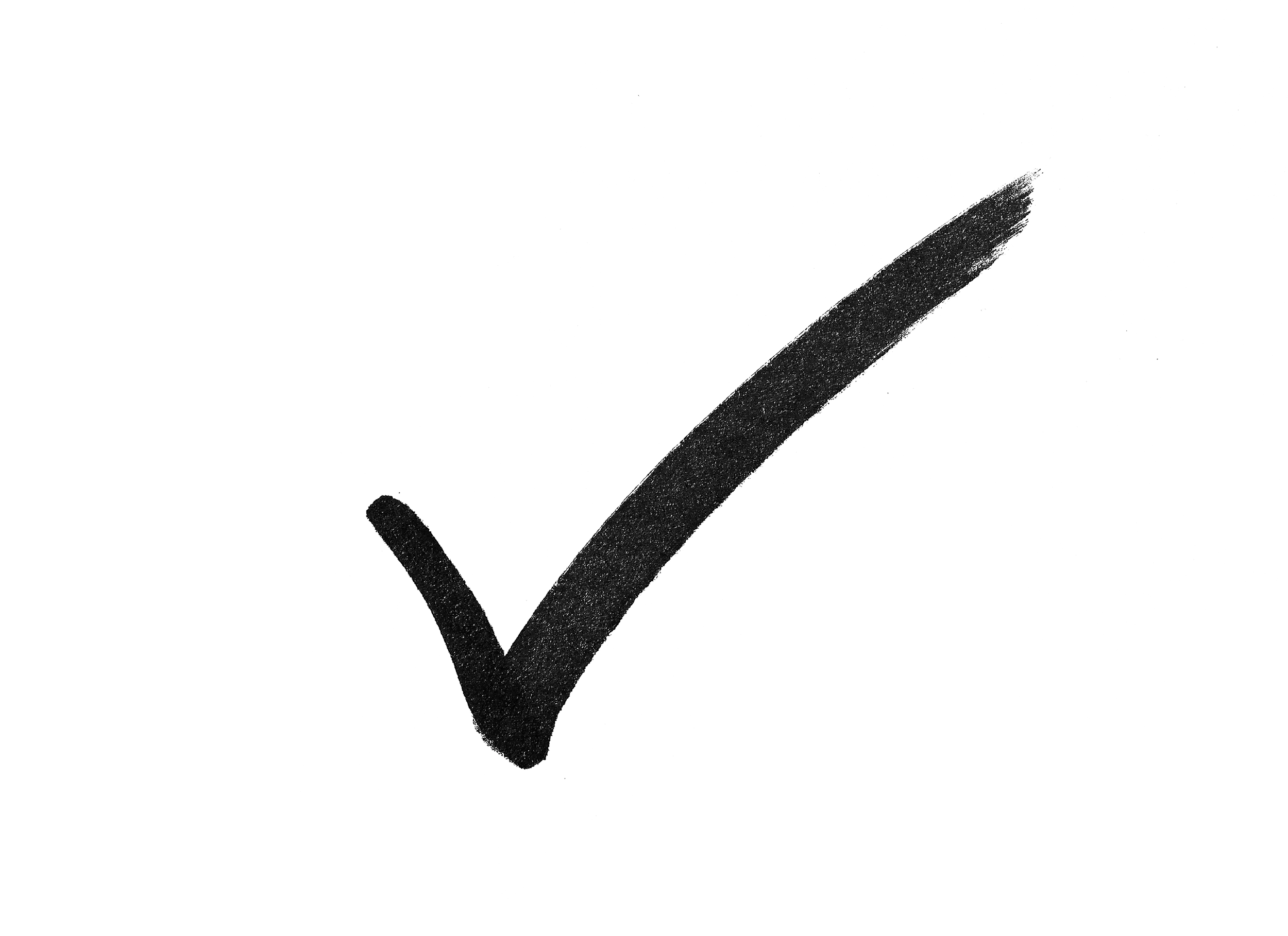 A close-up of a black checkmark marking on a black chalkboard or black surface.