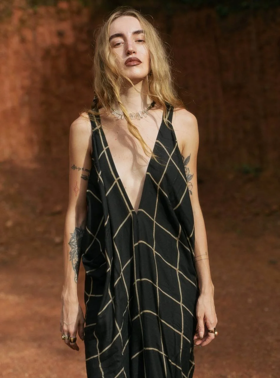 Olivia, founder and maker of OJAS Studio, independent handcrafted jewelry brand