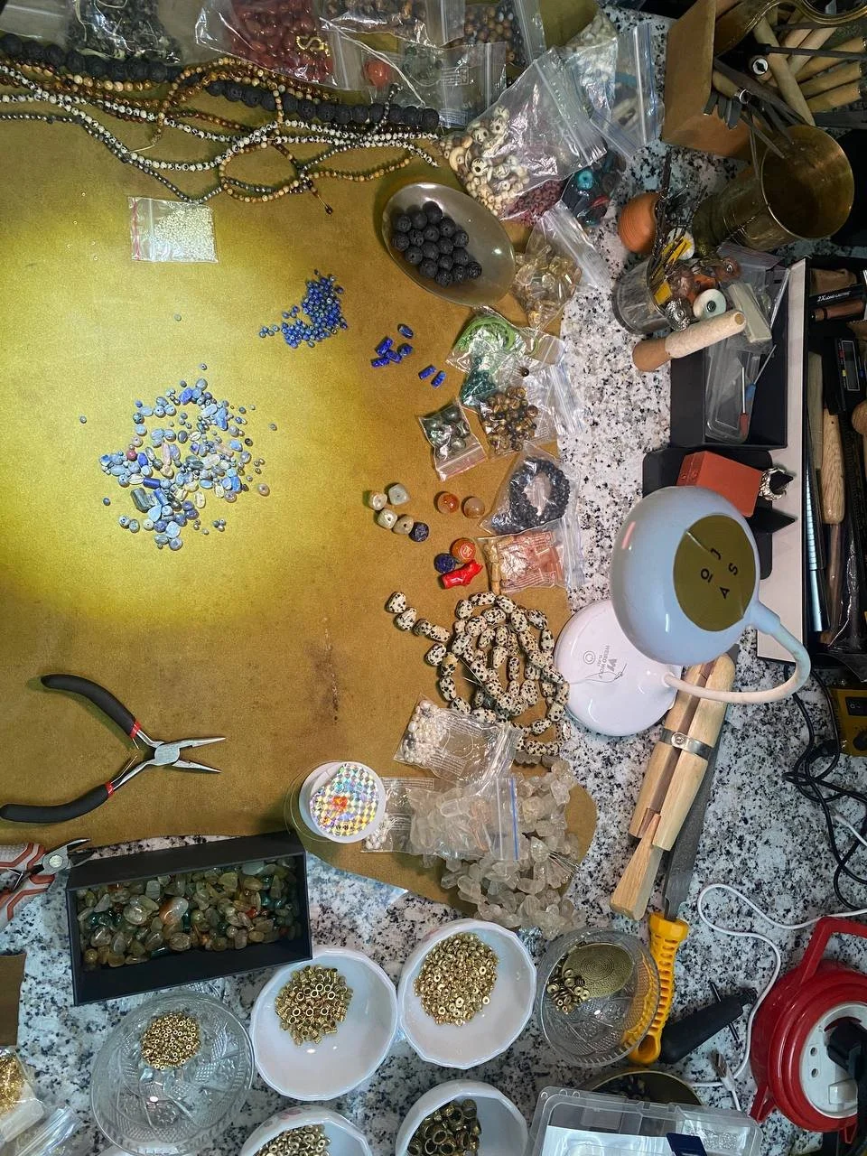 OJAS Studio beading nights — natural gemstones, organic materials, and metal