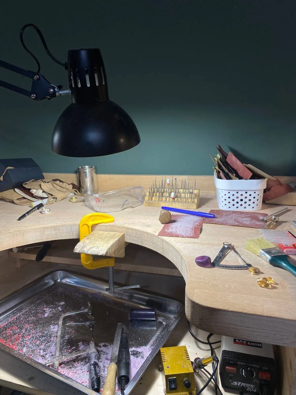 OJAS Studio jewelry workbench — handmade sterling silver jewelry made using traditional silversmithing tools